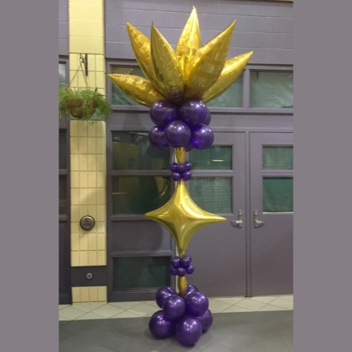 purple and gold balloon column