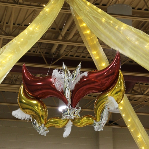 gold organza with lights and red and gold foil balloons