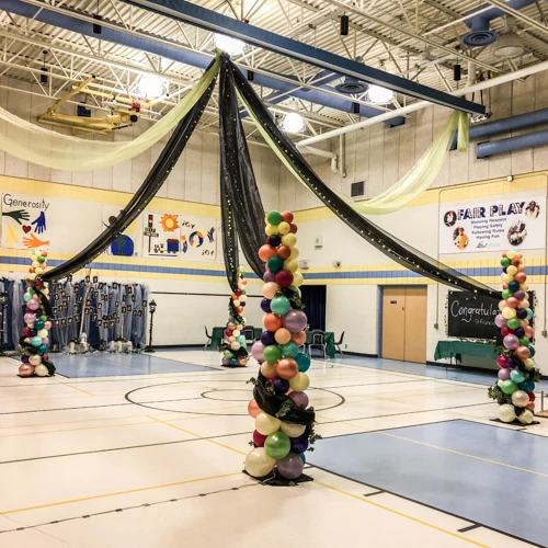 colourful balloon columns in dance floor canopy