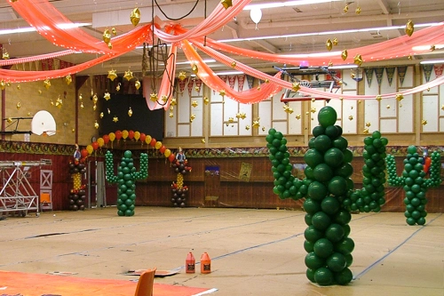 green balloon cacti columns for western theme dance canopy