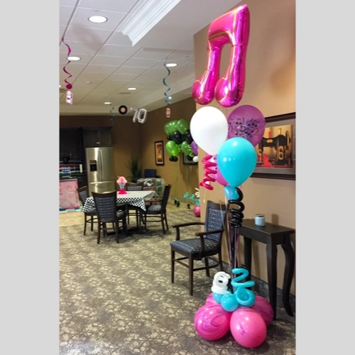 balloon bouquet with foil music notes for a birthday party