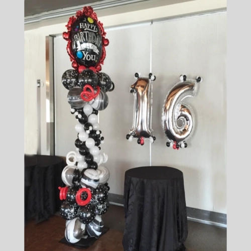 black, white, and red column for 16th birthday party