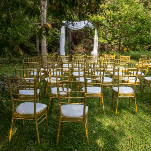 chiavari chairs set up for outdoor wedding