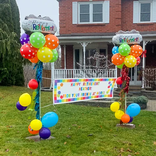 balloon bouquets with retirement wishes sign