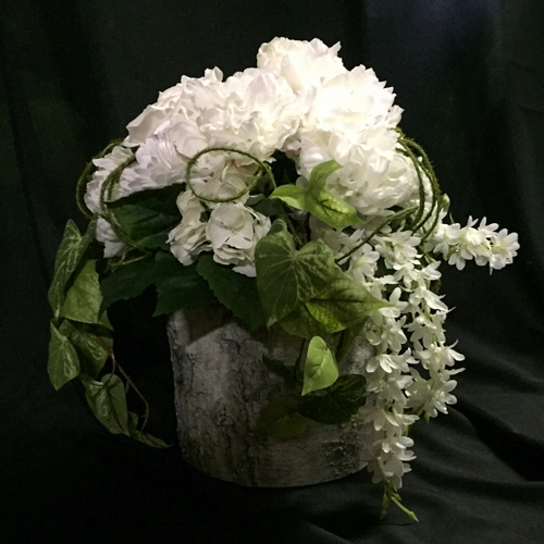 faux birch pot with flowers