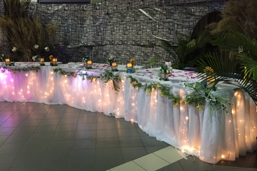 focal table with lights and garlands