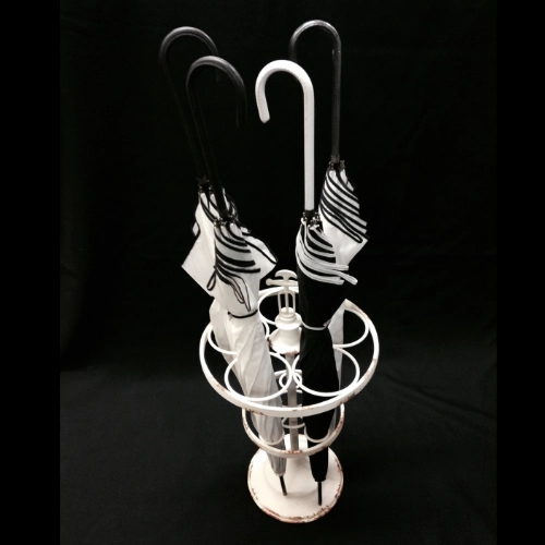 rustic umbrella stand with umbrellas